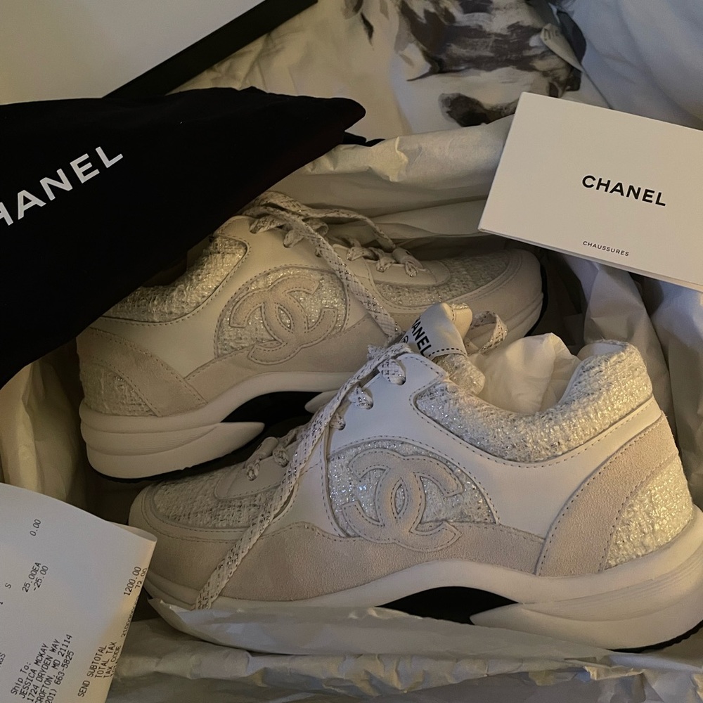 Chanel 2023 white and silver sneakers.